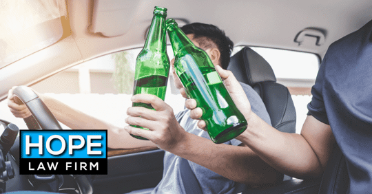 two alcohol containers in vehicle