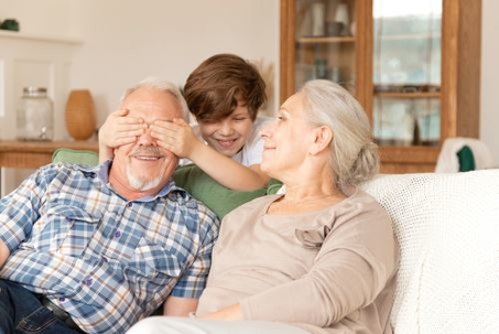 grandson playing with grandparents